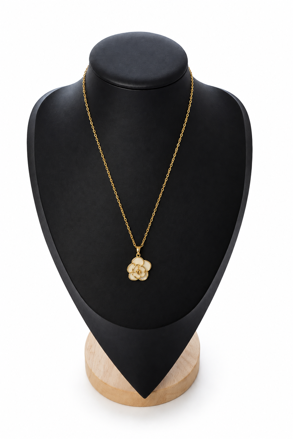 Cream floral pendant necklace on a plain white background